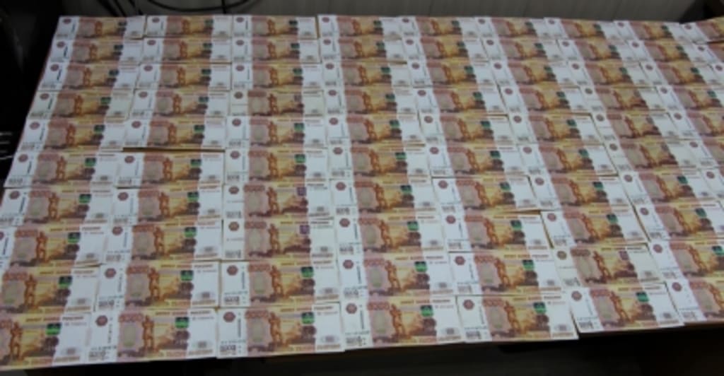 Бизнесмен из Барнаула передал 1 млн рублей сотруднику ФСБ в качестве взятки Фото №1